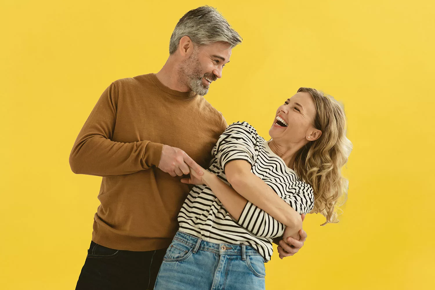Joyful Couple Dancing Having Fun At Home. Loving Husband And Wife Having Date Hugging And Laughing Indoors. Romantic Relationship And Happy Marriage Concept